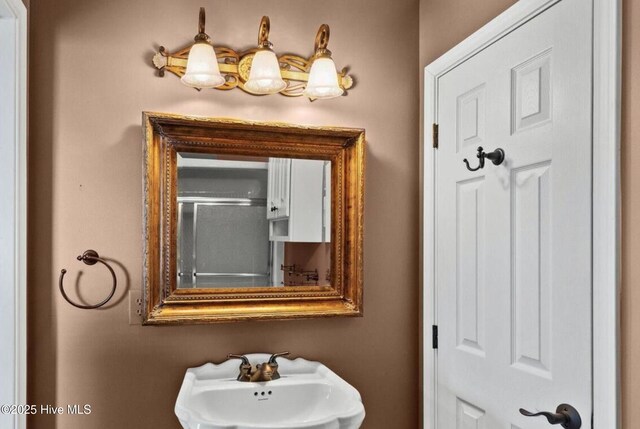 108 Kiawa Way, Atlantic Beach, NC 28512 - bathroom with a sink and an enclosed shower