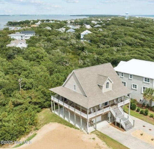 108 Kiawa Way, Atlantic Beach, NC 28512 - view of subject property featuring a forest and a nearby body of water