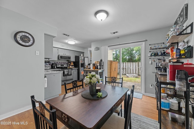 24 Donnell, Havelock, NC 28532 - dining room with light wood-type flooring and baseboards