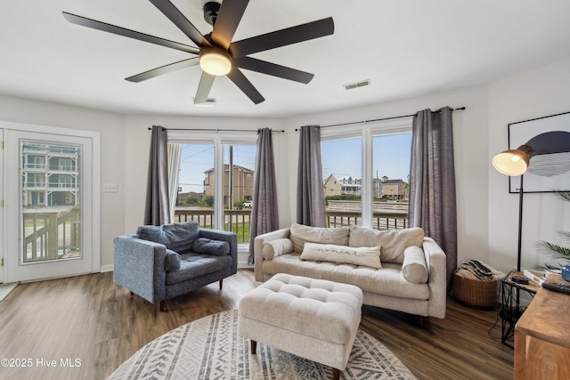 3045 Island Dr, North Topsail Beach, NC 28460 - living area with wood finished floors and ceiling fan