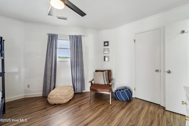3045 Island Dr, North Topsail Beach, NC 28460 - living area featuring wood finished floors, ceiling fan, and crown molding