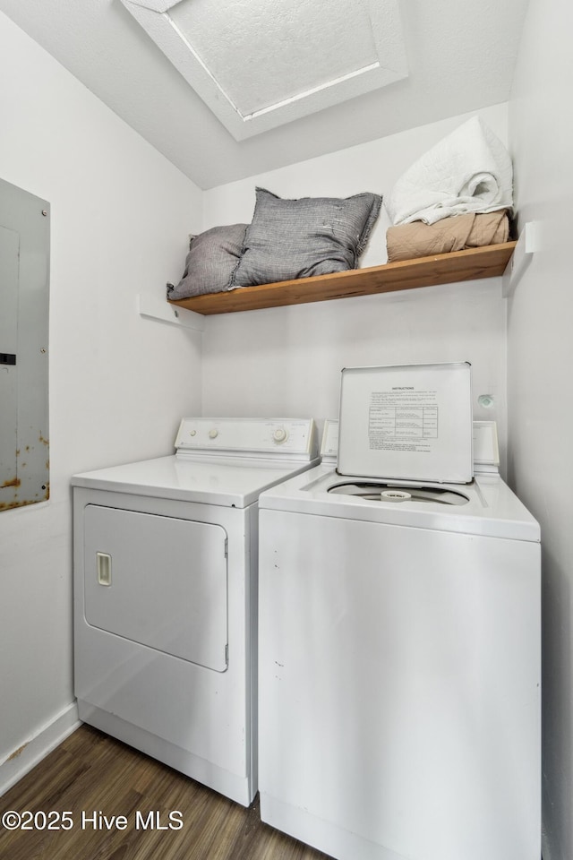 3045 Island Dr, North Topsail Beach, NC 28460 - laundry room with separate washer and dryer, dark wood-style floors, electric panel, and baseboards