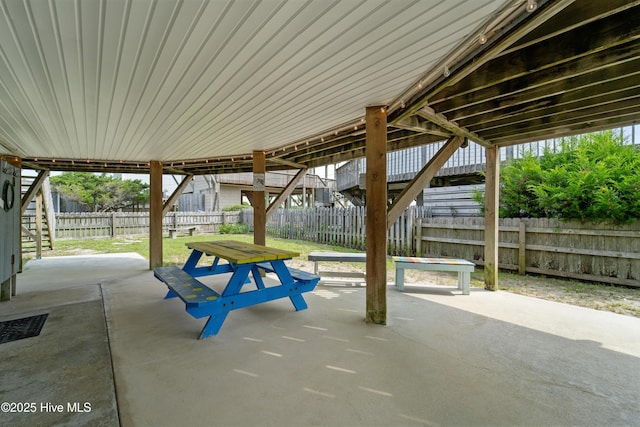 3045 Island Dr, North Topsail Beach, NC 28460 - fenced backyard featuring a patio and stairs