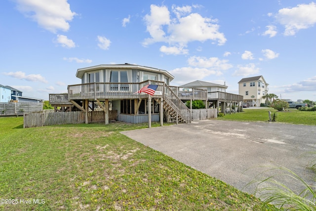 3045 Island Dr, North Topsail Beach, NC 28460 - view of front of house with stairway and a wooden deck