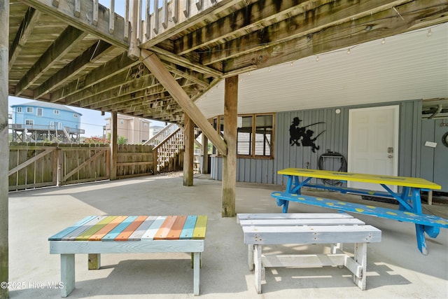 3045 Island Dr, North Topsail Beach, NC 28460 - view of patio / terrace featuring stairs