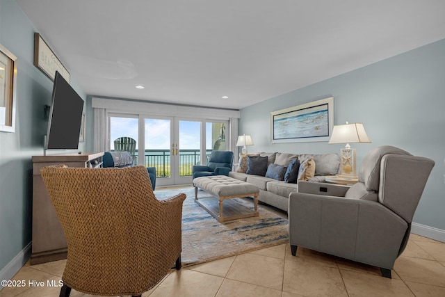 331 Salter Path Rd Unit 211, Pine Knoll Shores, NC 28512 - living room featuring baseboards, light tile patterned floors, and recessed lighting