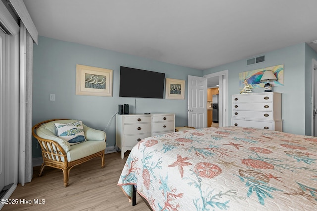 331 Salter Path Rd Unit 211, Pine Knoll Shores, NC 28512 - bedroom featuring light wood finished floors