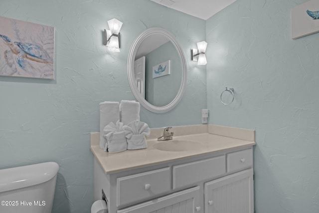 331 Salter Path Rd Unit 211, Pine Knoll Shores, NC 28512 - bathroom with vanity and toilet