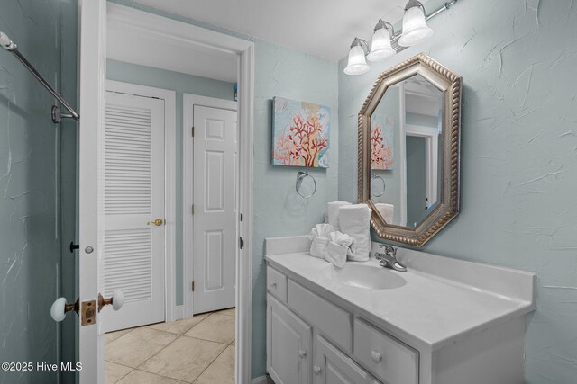 331 Salter Path Rd Unit 211, Pine Knoll Shores, NC 28512 - bathroom with vanity and tile patterned flooring