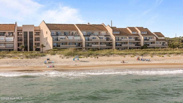 331 Salter Path Rd Unit 211, Pine Knoll Shores, NC 28512 - view of apartment building / complex with view of water and beach