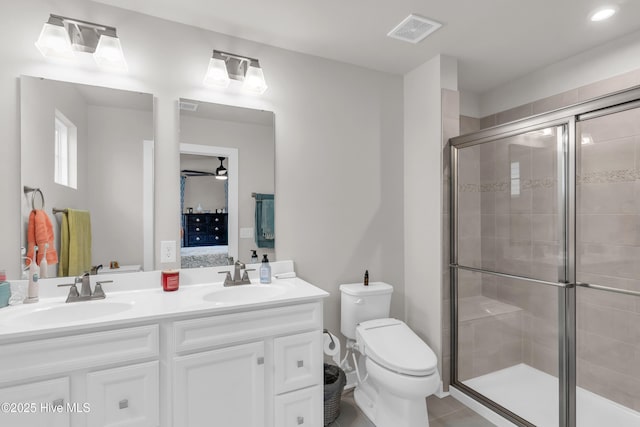 818 Ashlar Cir, Navassa, NC 28451 - full bathroom with toilet, double vanity, a stall shower, a ceiling fan, and recessed lighting
