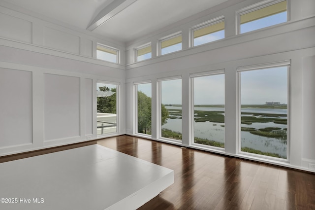 1064 Ocean Ridge Dr, Wilmington, NC 28405 - unfurnished sunroom featuring beam ceiling and a water view