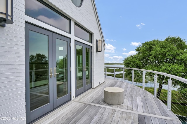 1064 Ocean Ridge Dr, Wilmington, NC 28405 - wooden terrace featuring french doors and a water view