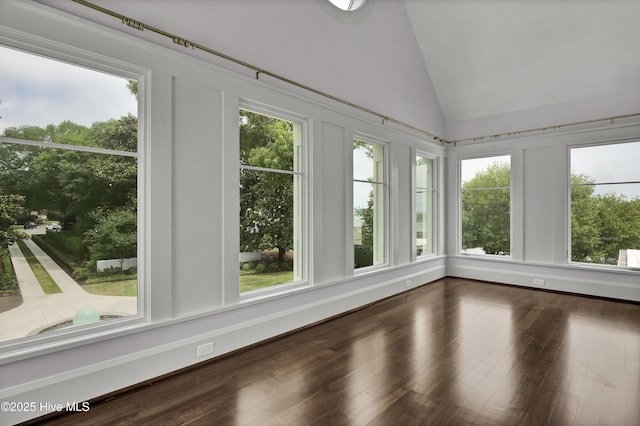 1064 Ocean Ridge Dr, Wilmington, NC 28405 - unfurnished sunroom featuring vaulted ceiling, healthy amount of natural light, and wood finished floors