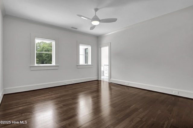 1064 Ocean Ridge Dr, Wilmington, NC 28405 - empty room featuring wood finished floors, baseboards, a ceiling fan, and crown molding
