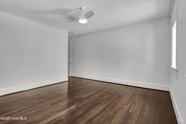 1064 Ocean Ridge Dr, Wilmington, NC 28405 - empty room featuring dark wood-type flooring, a ceiling fan, and baseboards