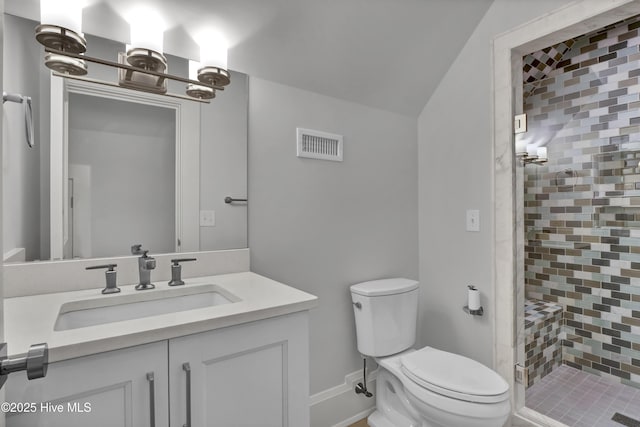 1064 Ocean Ridge Dr, Wilmington, NC 28405 - full bathroom featuring a shower stall, toilet, vanity, and baseboards