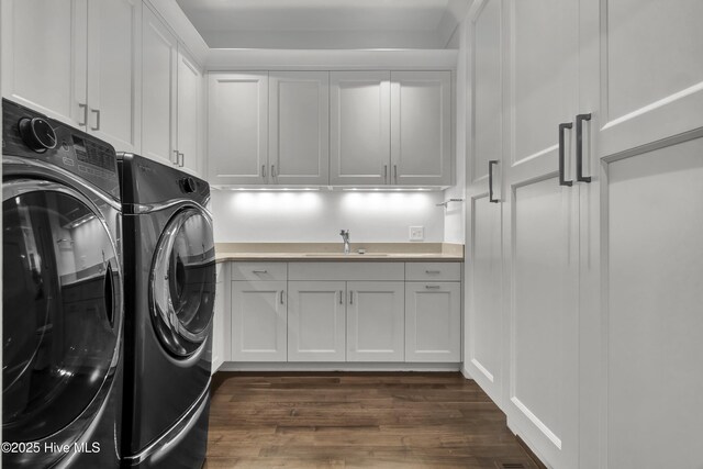 1064 Ocean Ridge Dr, Wilmington, NC 28405 - laundry area featuring cabinet space, washer and dryer, and dark wood-type flooring
