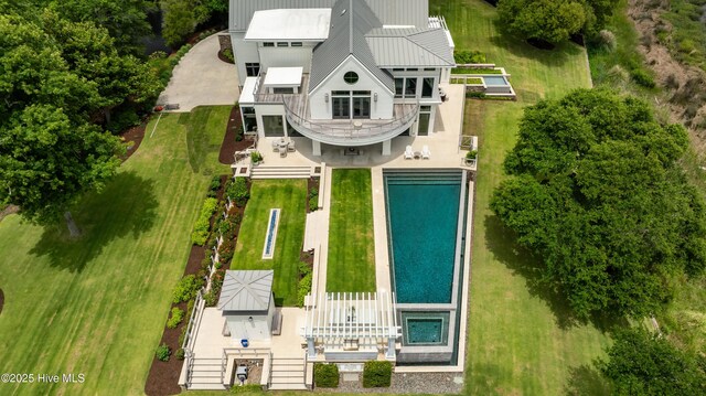 1064 Ocean Ridge Dr, Wilmington, NC 28405 - aerial view of property and surrounding area featuring a pool area