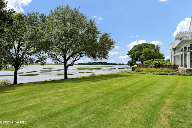 1064 Ocean Ridge Dr, Wilmington, NC 28405 - view of green lawn featuring a water view