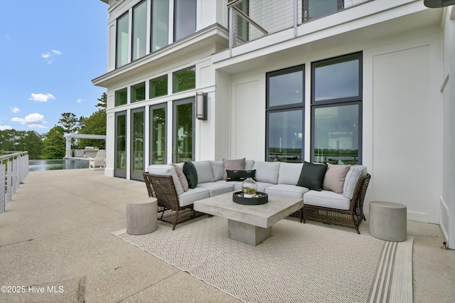 1064 Ocean Ridge Dr, Wilmington, NC 28405 - view of patio / terrace featuring an outdoor living space, a balcony, and a water view
