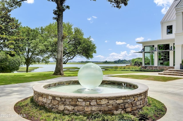 1064 Ocean Ridge Dr, Wilmington, NC 28405 - surrounding community featuring a water view and a lawn