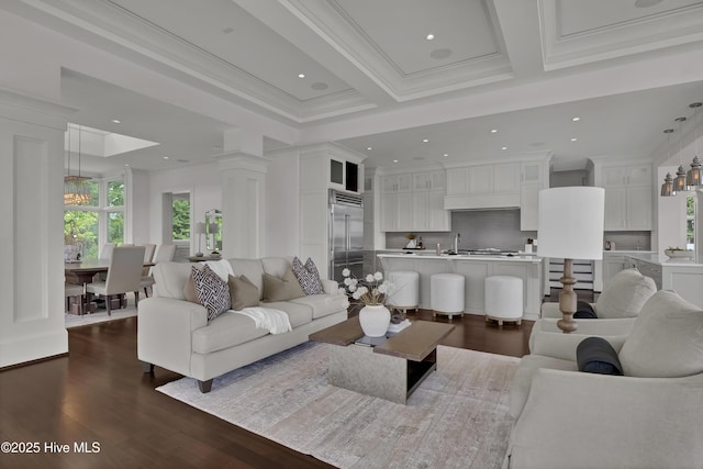 1064 Ocean Ridge Dr, Wilmington, NC 28405 - living room featuring dark wood-style flooring, recessed lighting, ornamental molding, and decorative columns