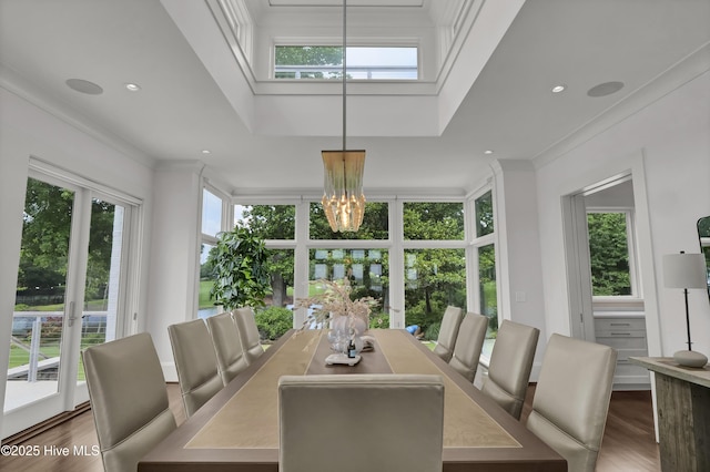 1064 Ocean Ridge Dr, Wilmington, NC 28405 - dining space featuring wood finished floors, plenty of natural light, a chandelier, crown molding, and recessed lighting