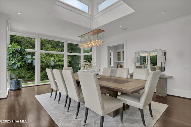 1064 Ocean Ridge Dr, Wilmington, NC 28405 - dining space with wood finished floors, a chandelier, and baseboards