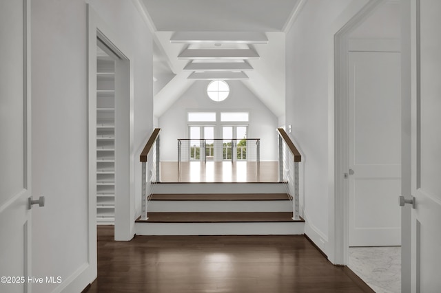 1064 Ocean Ridge Dr, Wilmington, NC 28405 - staircase featuring wood finished floors and vaulted ceiling