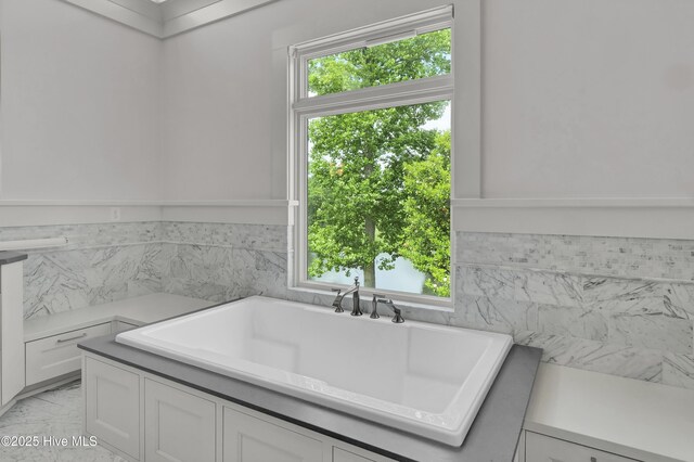 1064 Ocean Ridge Dr, Wilmington, NC 28405 - bathroom with a tub to relax in and marble finish floors