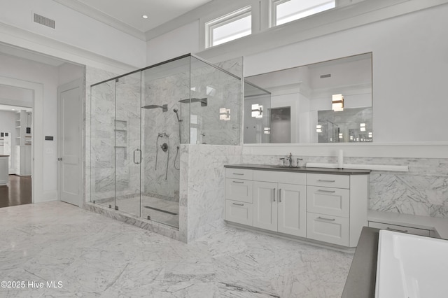 1064 Ocean Ridge Dr, Wilmington, NC 28405 - full bath featuring a marble finish shower, vanity, marble finish flooring, and a bathtub