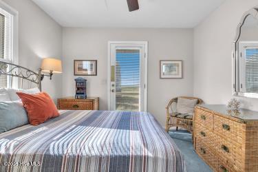6707 Kings Lynn Dr, Oak Island, NC 28465 - view of carpeted bedroom