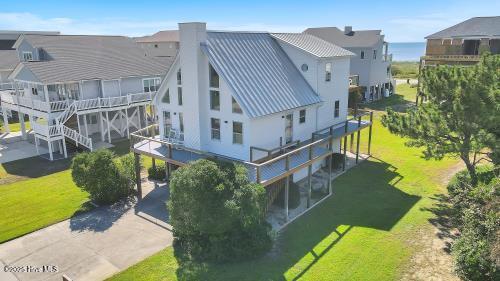 6707 Kings Lynn Dr, Oak Island, NC 28465 - view of subject property