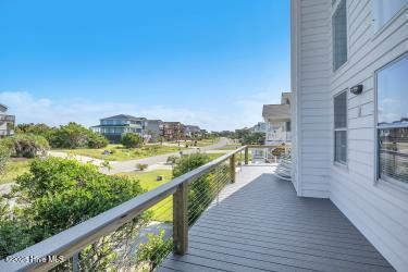 6707 Kings Lynn Dr, Oak Island, NC 28465 - view of wooden terrace
