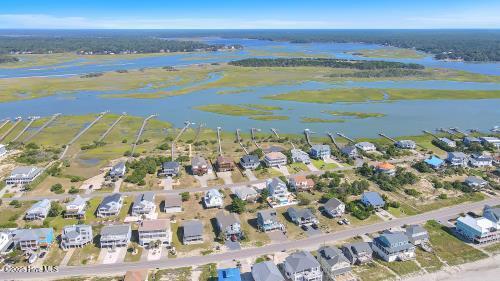 6707 Kings Lynn Dr, Oak Island, NC 28465 - view of property location with a nearby body of water