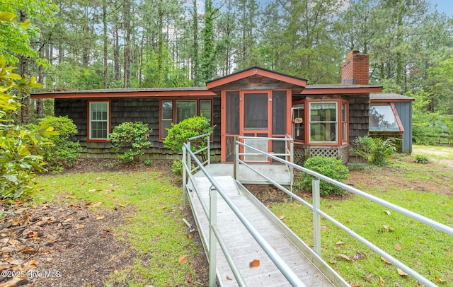 1772 NC-5 Hwy, Aberdeen, NC 28315 - view of front of home featuring a chimney