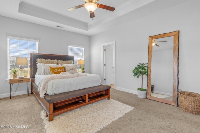 100 Little Acorn Trl, Moyock, NC 27958 - carpeted bedroom featuring a raised ceiling, crown molding, baseboards, and ceiling fan
