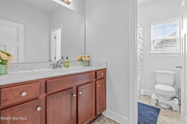 100 Little Acorn Trl, Moyock, NC 27958 - bathroom featuring vanity, toilet, baseboards, and shower / bath combo