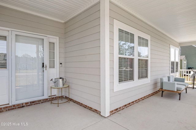 100 Little Acorn Trl, Moyock, NC 27958 - doorway to property with covered porch