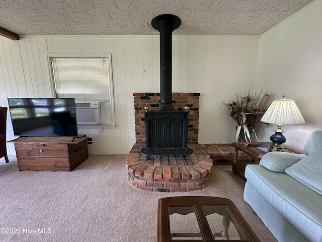 258 Hideaway Rd, Belhaven, NC 27810 - living room featuring an ornate ceiling, carpet flooring, a wood stove, and cooling unit