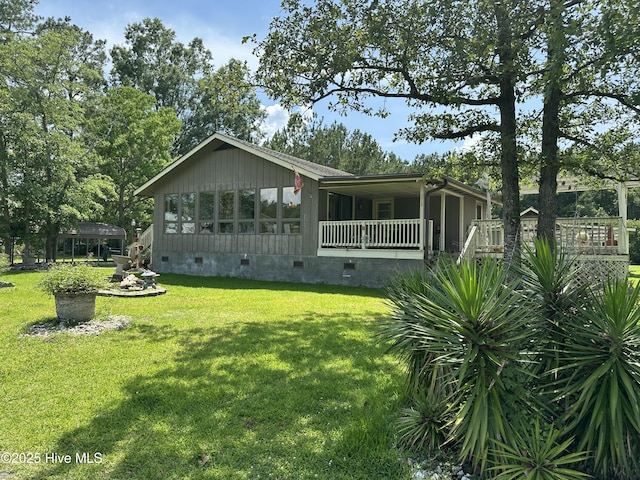 258 Hideaway Rd, Belhaven, NC 27810 - view of front facade with crawl space and a front lawn