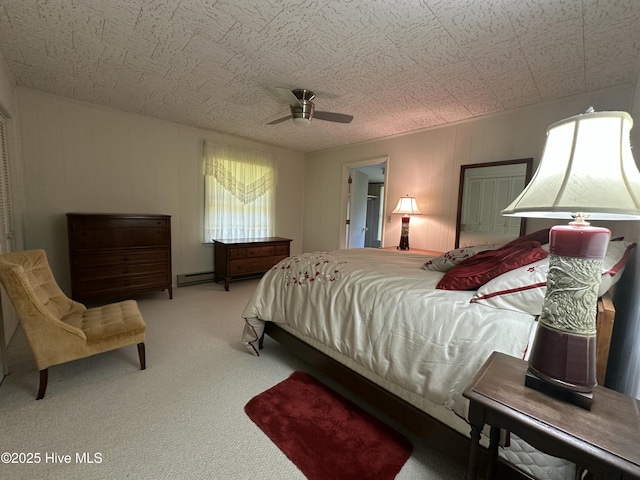 258 Hideaway Rd, Belhaven, NC 27810 - carpeted bedroom with ceiling fan and baseboard heating