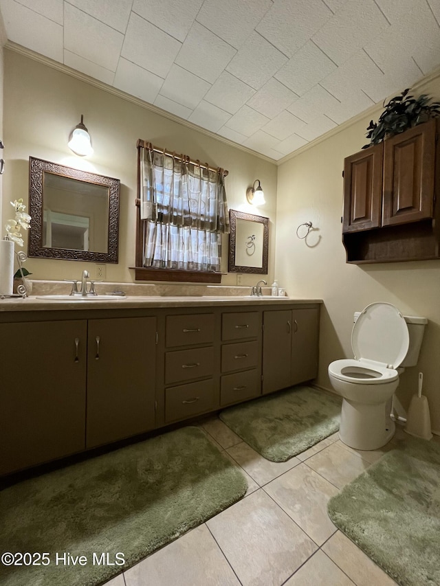 258 Hideaway Rd, Belhaven, NC 27810 - bathroom with double vanity, ornamental molding, and tile patterned flooring