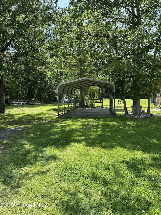 258 Hideaway Rd, Belhaven, NC 27810 - surrounding community featuring a lawn and a detached carport