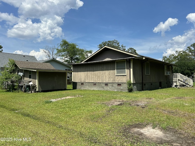 258 Hideaway Rd, Belhaven, NC 27810 - view of side of property featuring crawl space and a yard