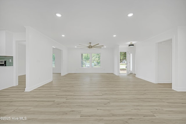 3825 Canterbury Rd, Wilmington, NC 28403 - unfurnished living room with light wood-style flooring, a ceiling fan, baseboards, and recessed lighting