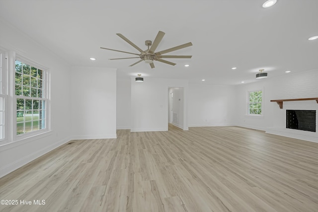 3825 Canterbury Rd, Wilmington, NC 28403 - unfurnished living room featuring plenty of natural light, recessed lighting, a ceiling fan, baseboards, and light wood-style flooring