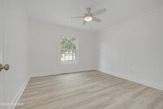 3825 Canterbury Rd, Wilmington, NC 28403 - empty room with light wood finished floors, baseboards, and a ceiling fan