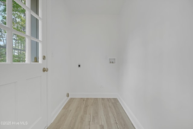 3825 Canterbury Rd, Wilmington, NC 28403 - laundry room with hookup for an electric dryer, light wood-style floors, washer hookup, and baseboards